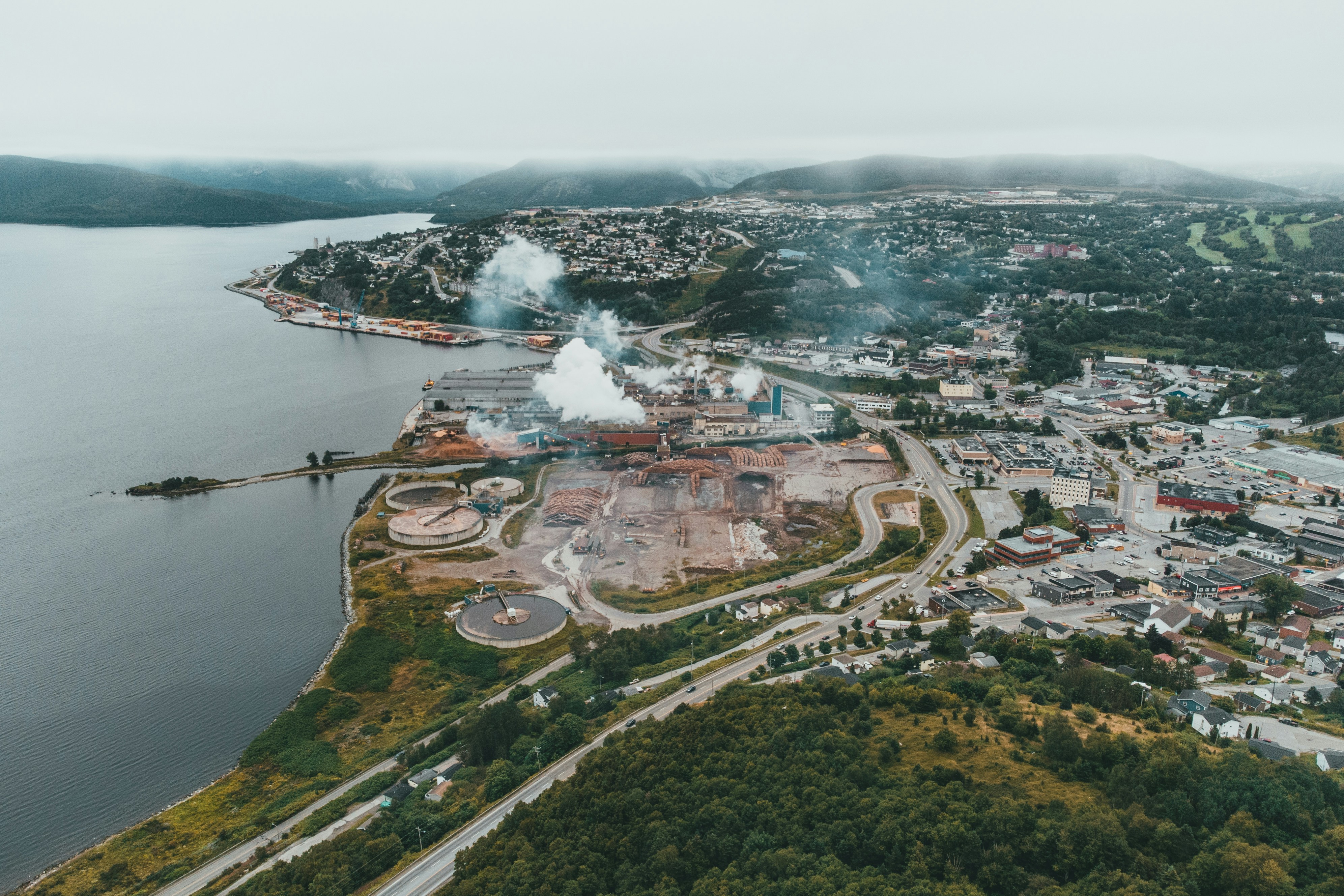 aerial view of city near body of water during daytime (Photo by Erik Mclean on Unsplash)