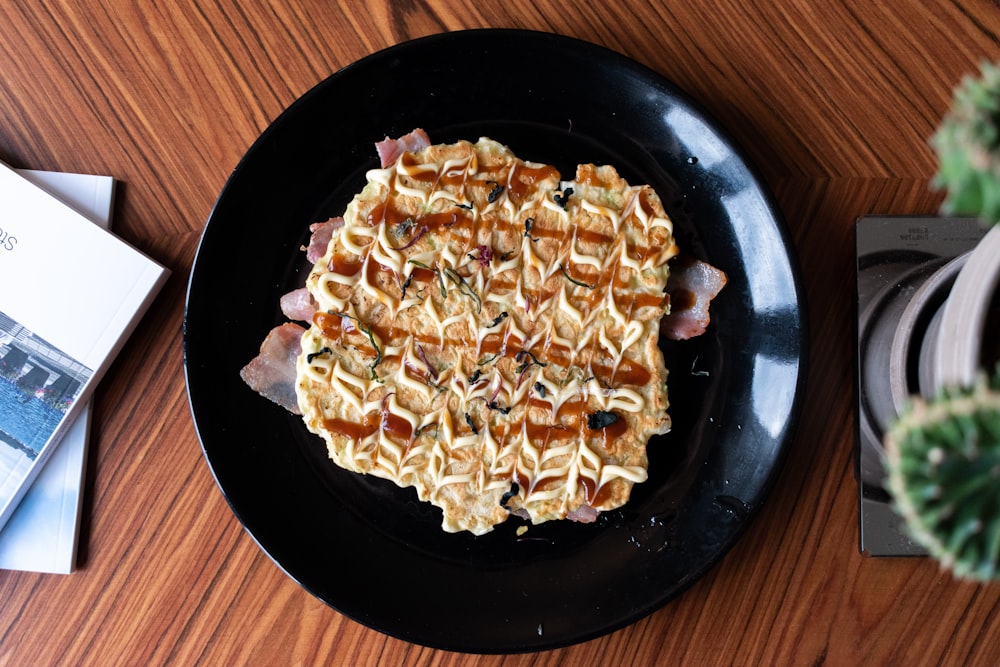 pasta on black ceramic plate