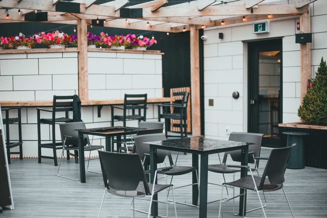 black wooden table and chairs