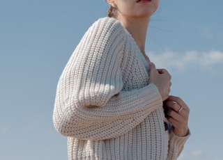 woman in white and black checkered dress shirt