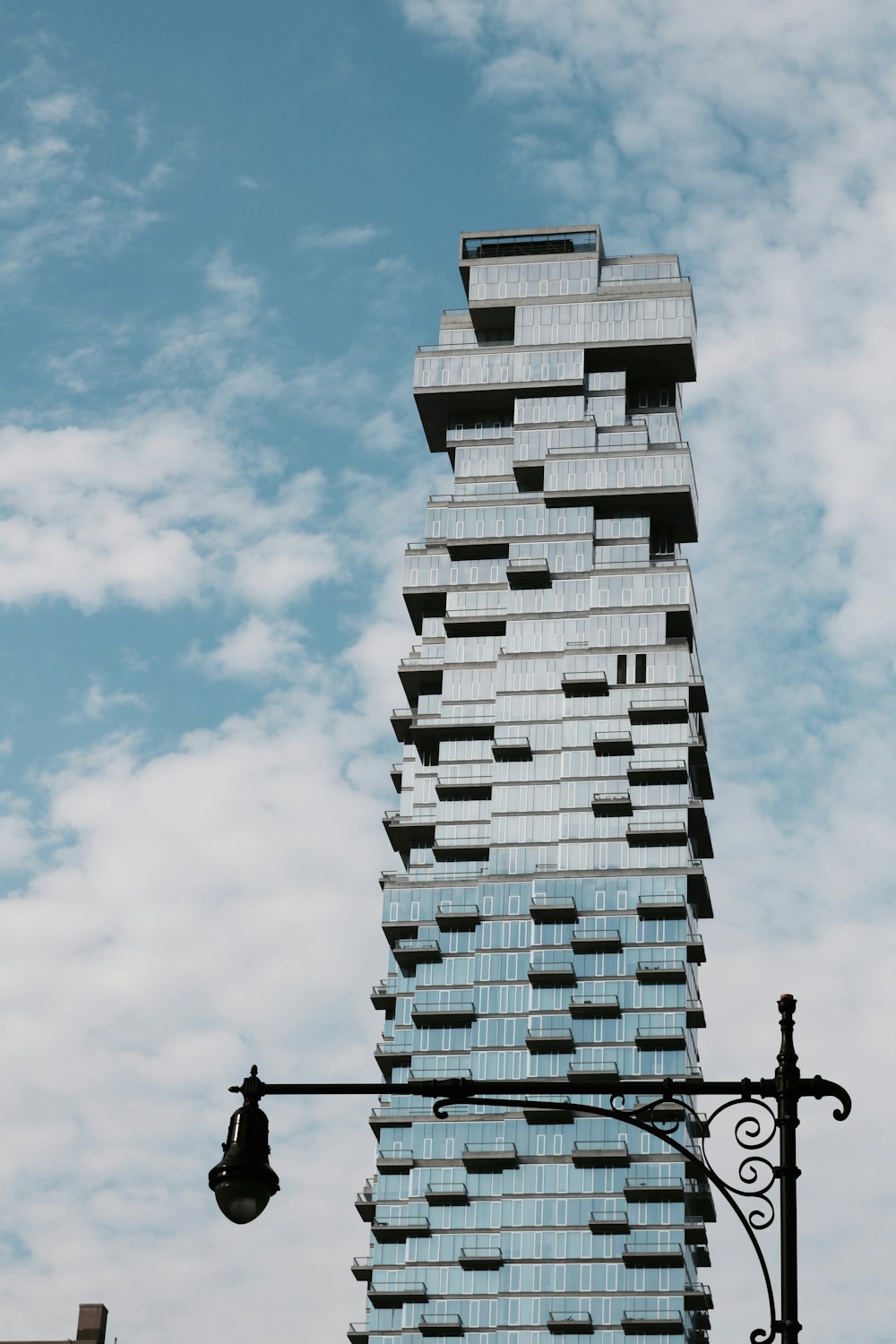 white and black concrete building under blue sky during daytime