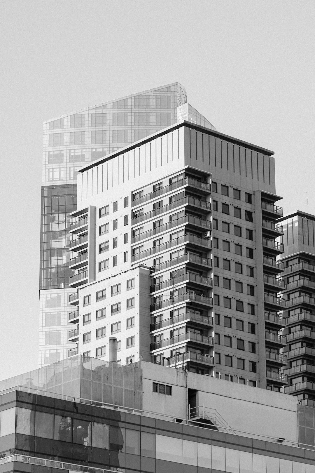 grayscale photo of high rise building