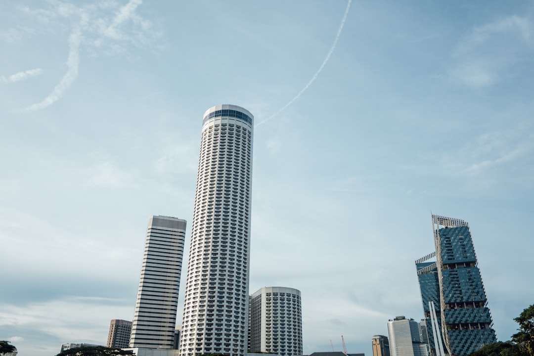 white and gray high rise building