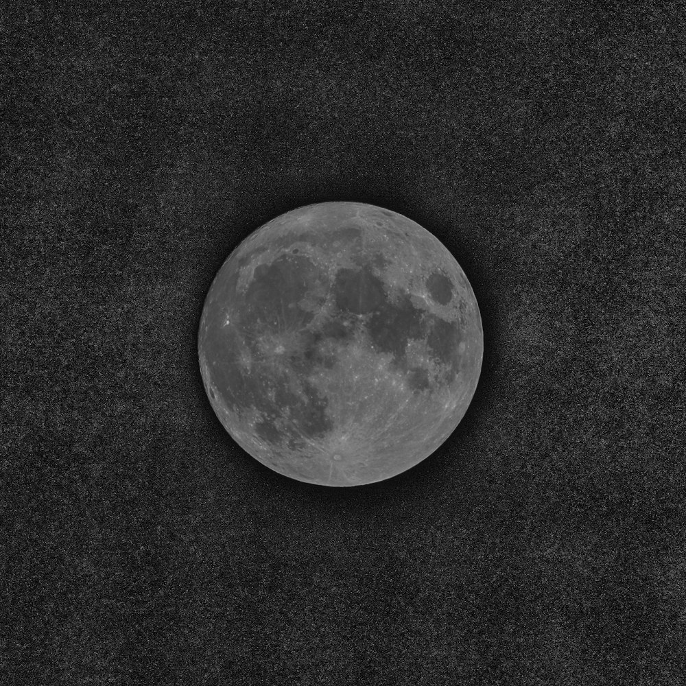 full moon on black textile