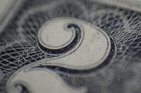 Close-up of a sleek paper currency counting machine in action