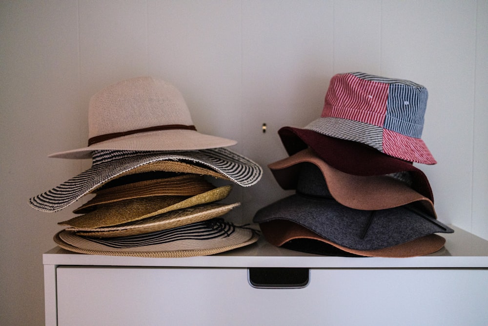 brown and black fedora hat