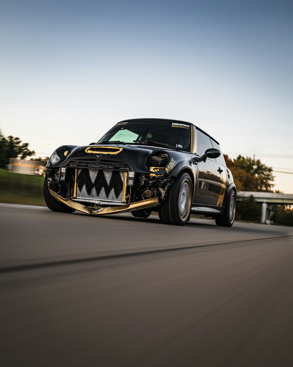 black and yellow porsche 911 on road during daytime