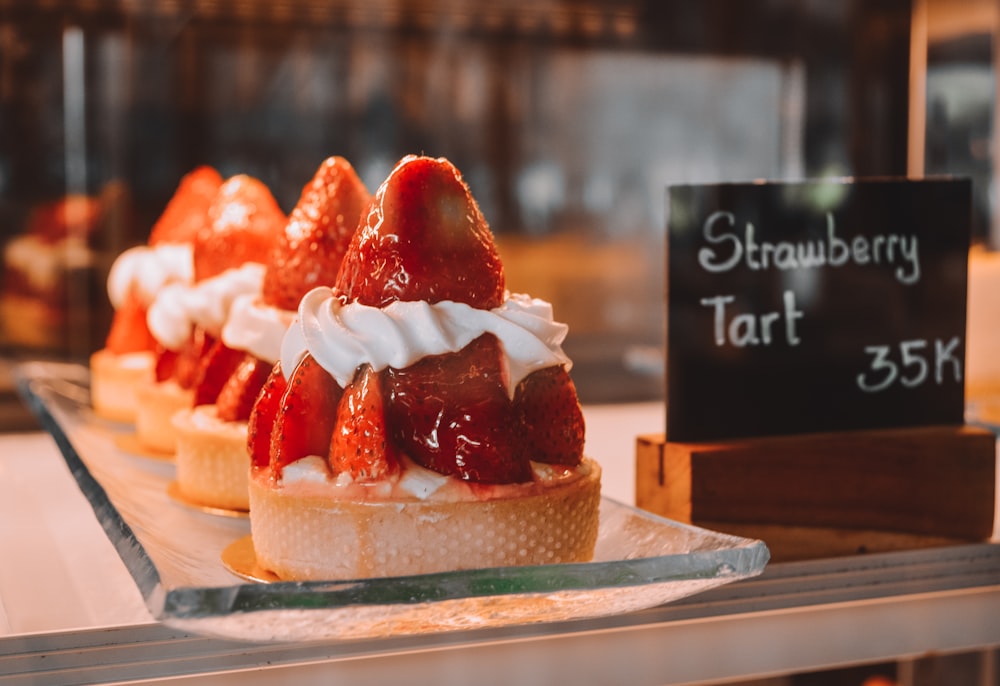 a close up of a plate of food with strawberries