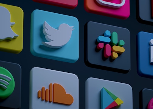 A collection of streaming platform logos including Spotify and Apple Music.