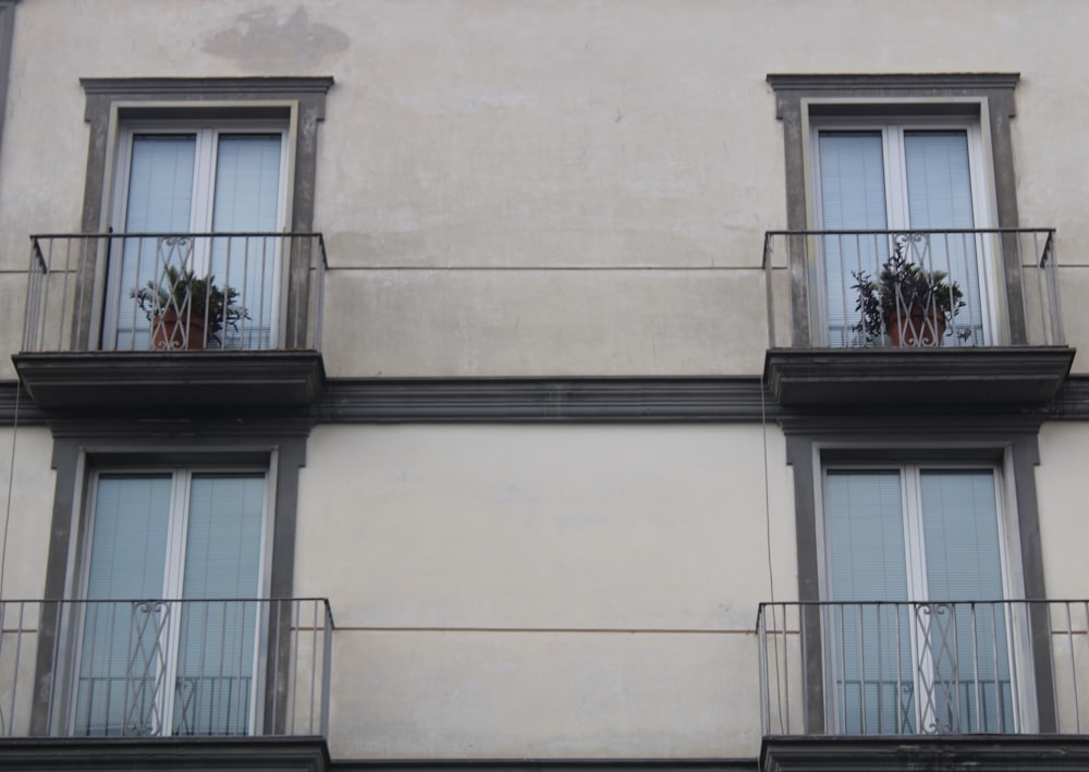 Black metal window frame on white concrete building photo – Free Minimal  Image on Unsplash