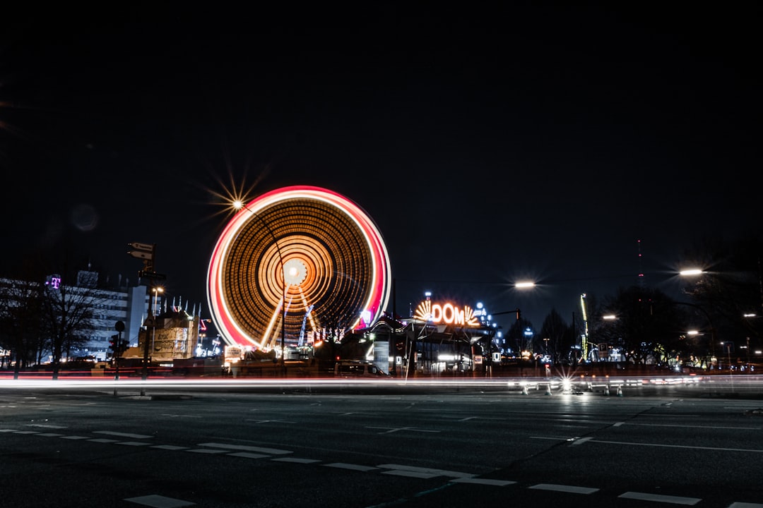 time lapse photography of ferris wheel during night time