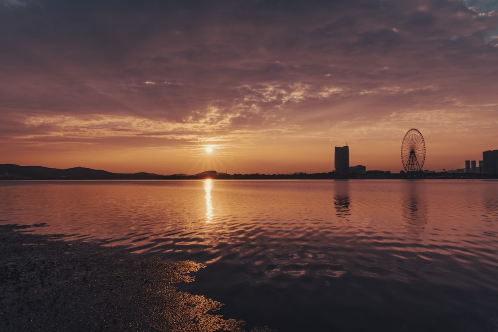 silhouette of building during sunset