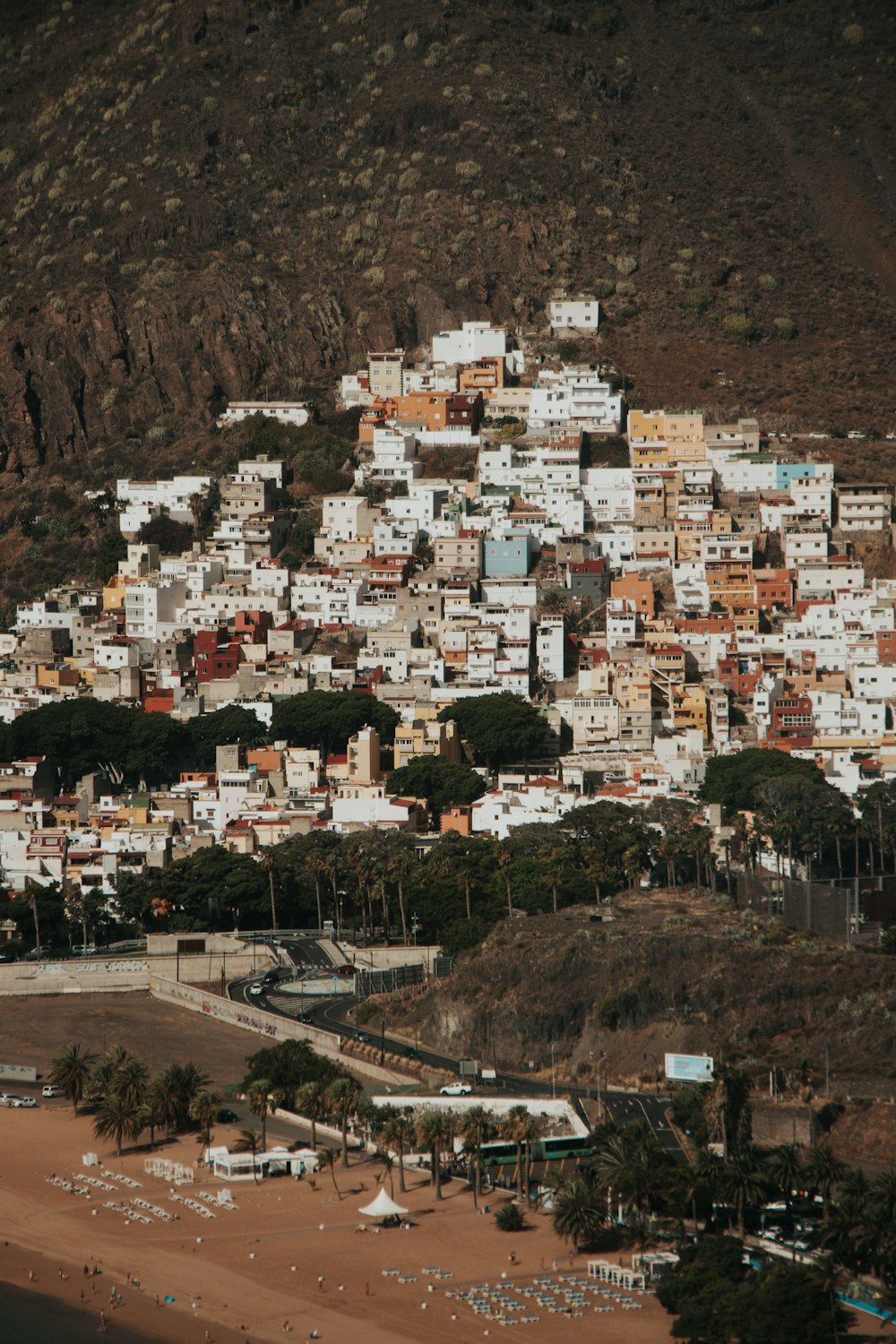 a large group of buildings on a hill side
