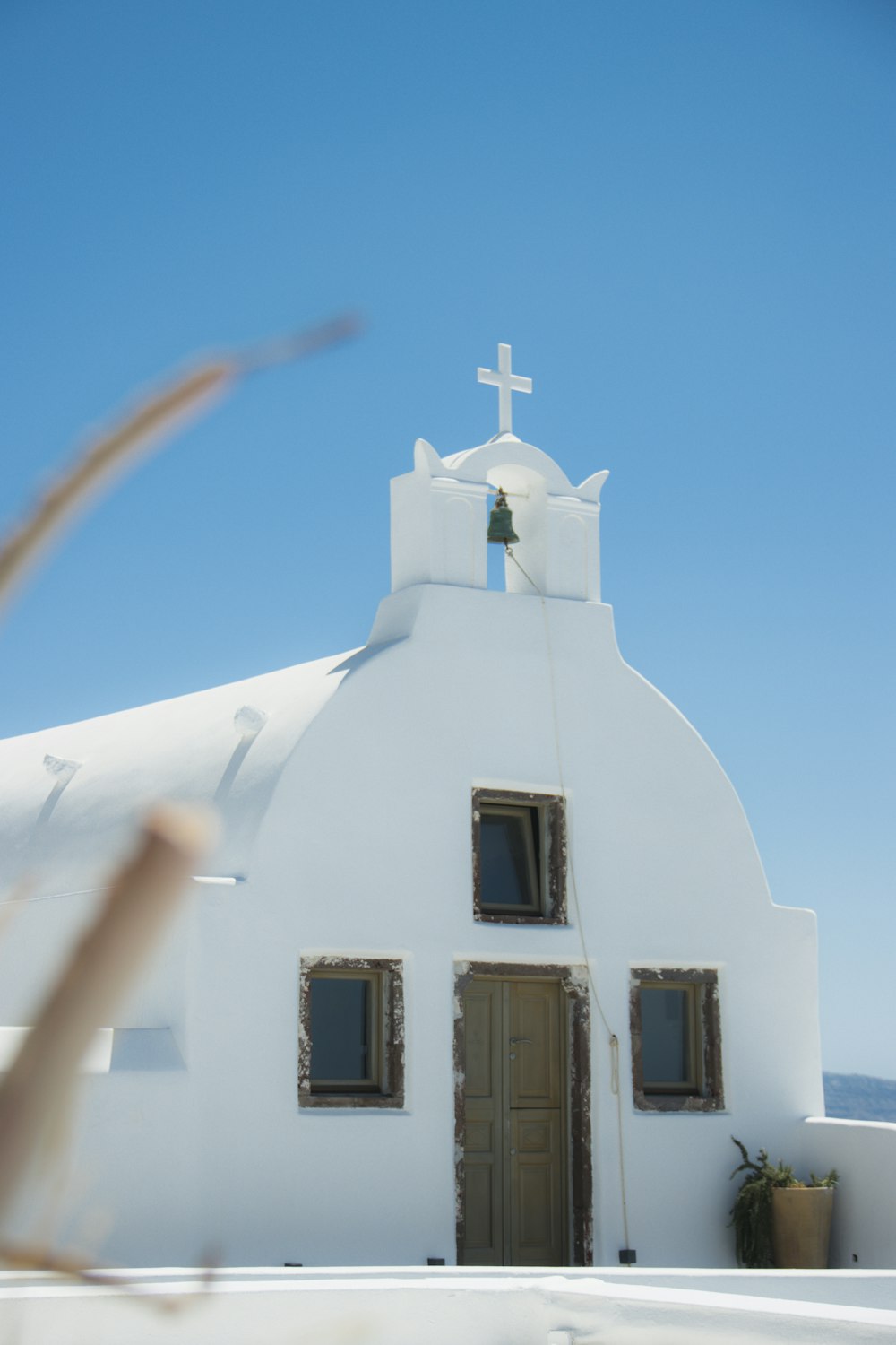 white concrete building under blue sky during daytime