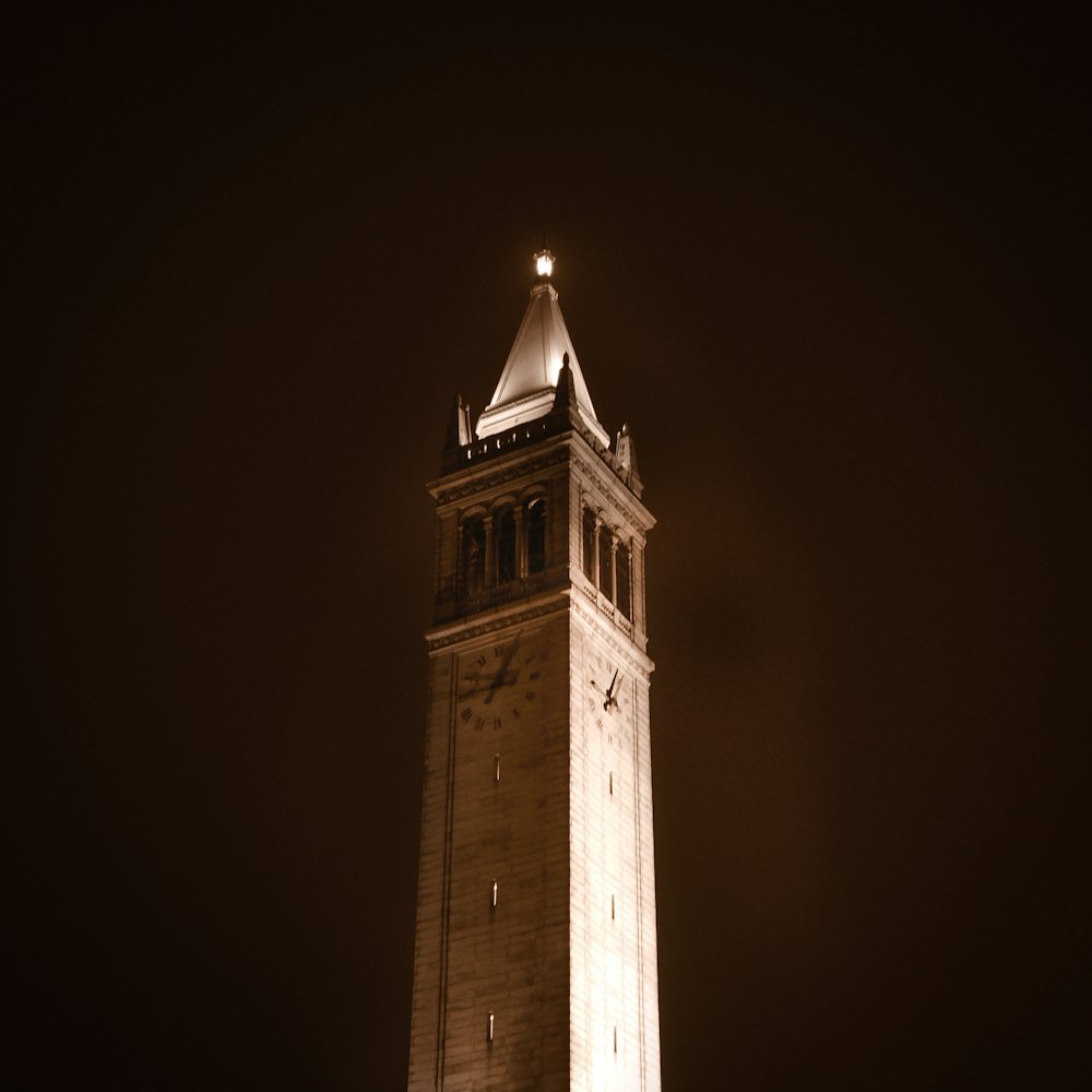 brown concrete tower with clock