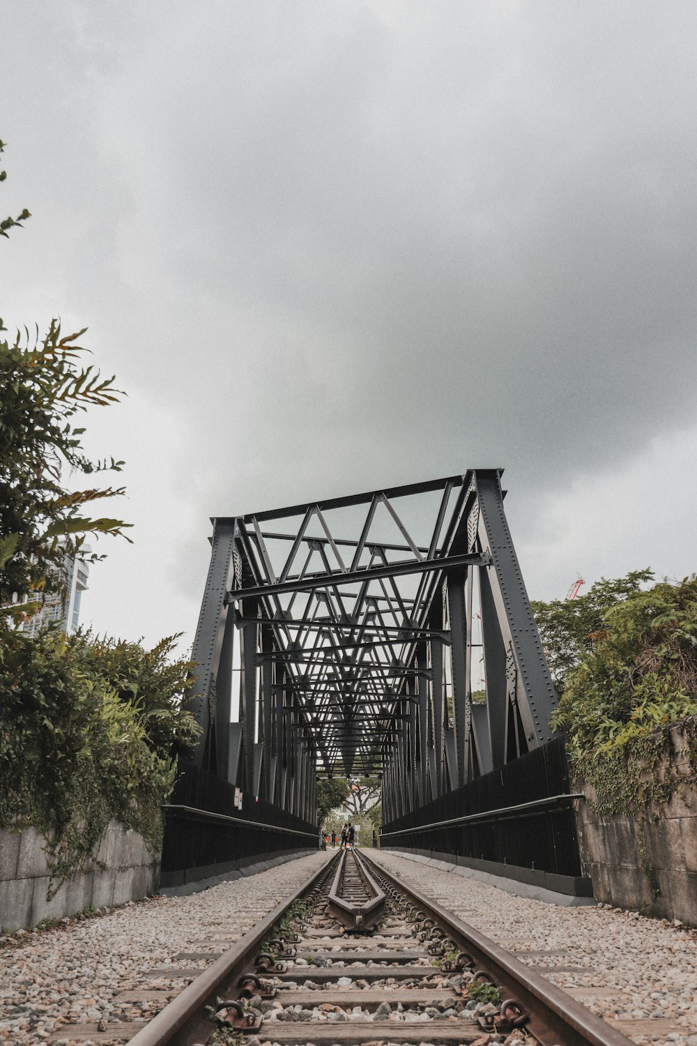 black metal bridge under white sky