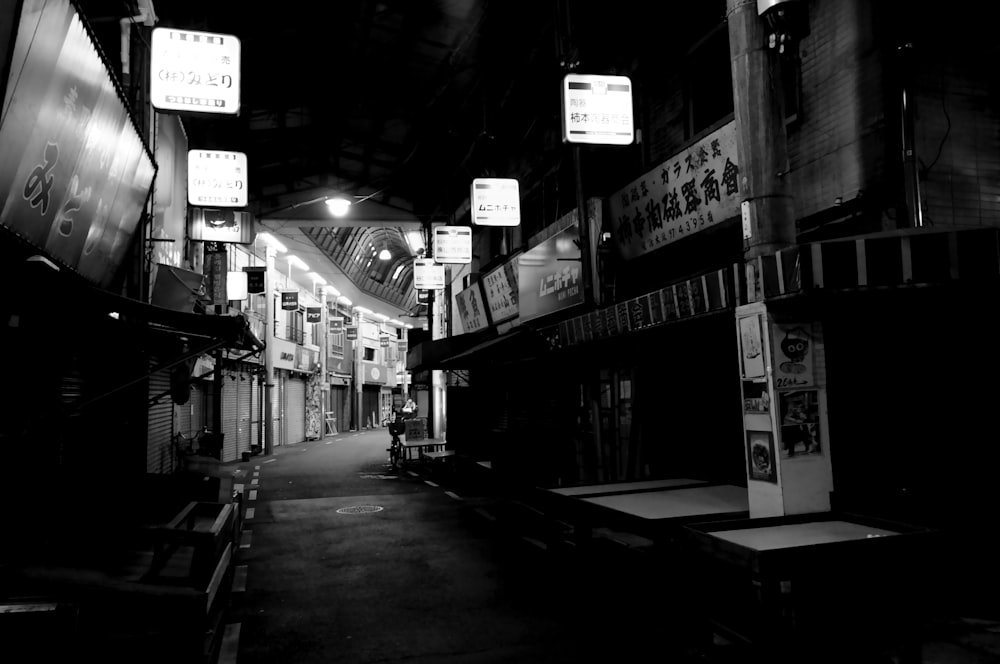 grayscale photo of store front