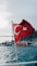 red and white flag on pole