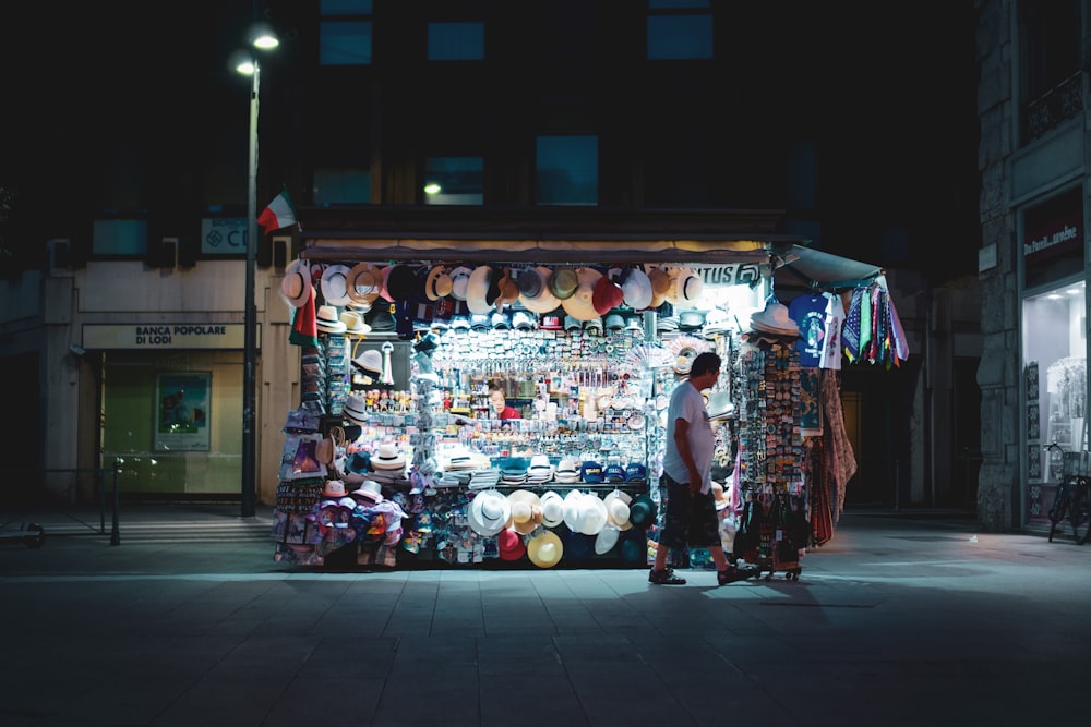 people walking on market during night time
