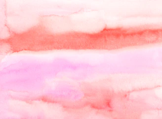 A serene watercolor palette with vibrant hues blending softly on a textured paper background.