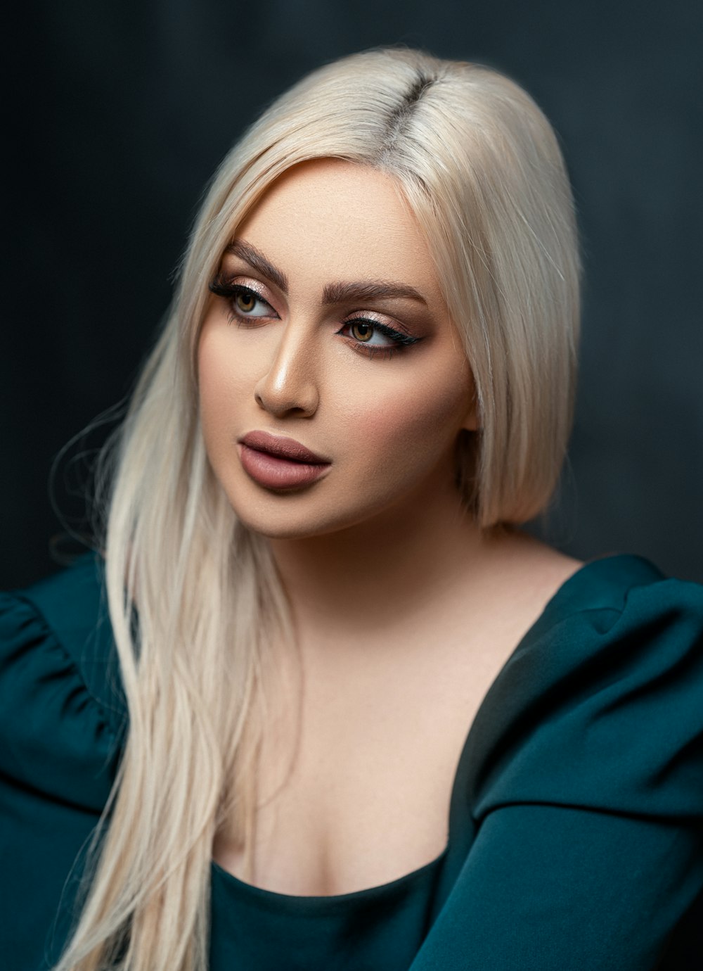 woman in blue blazer with blonde hair