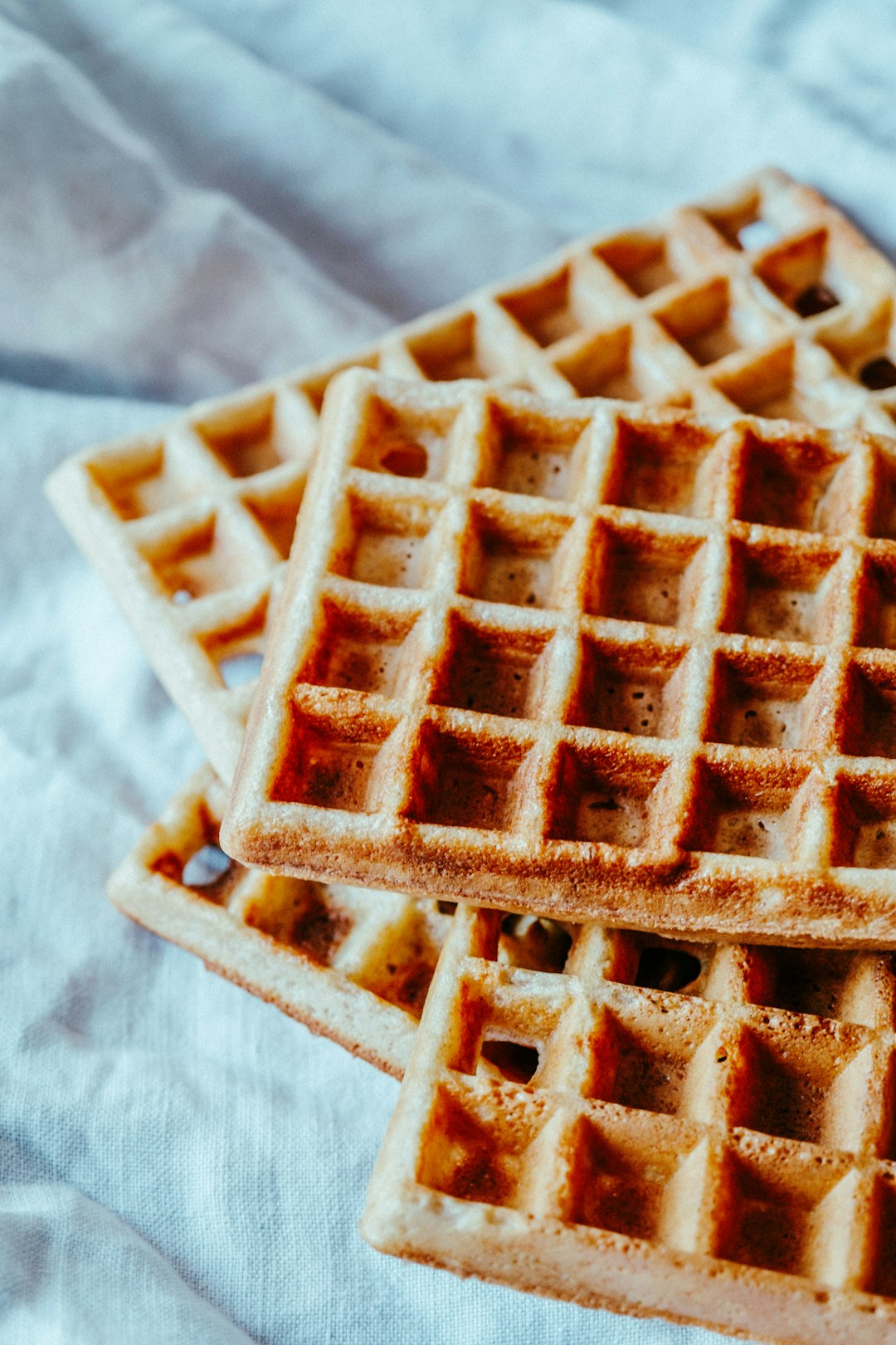 brown waffle on white textile