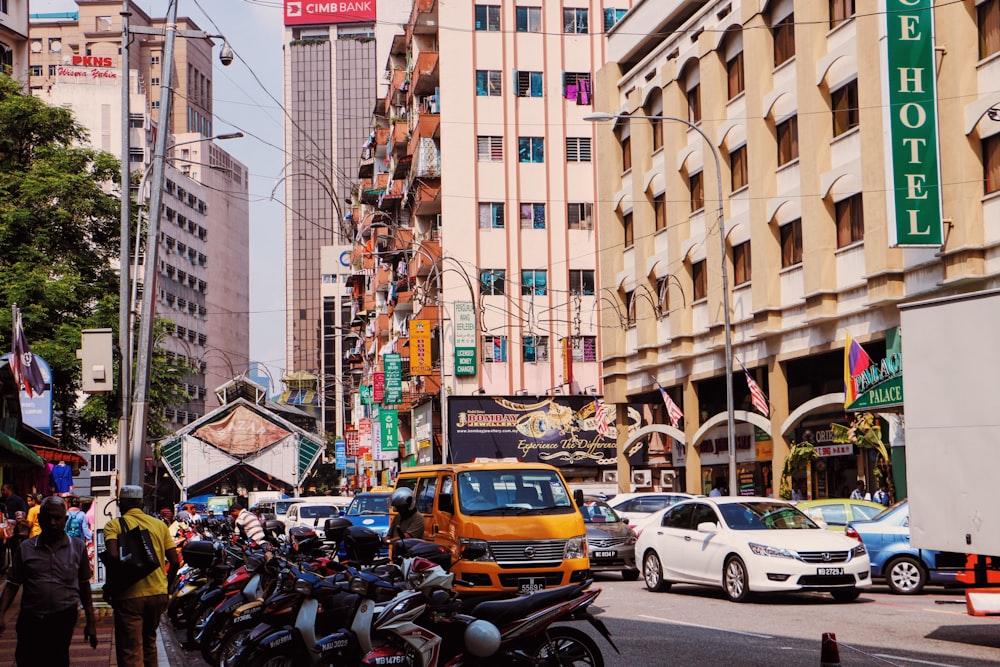 cars parked on street near buildings during daytime