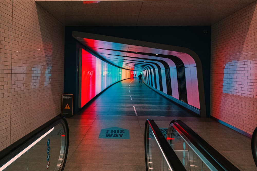 blue and red tunnel with lights