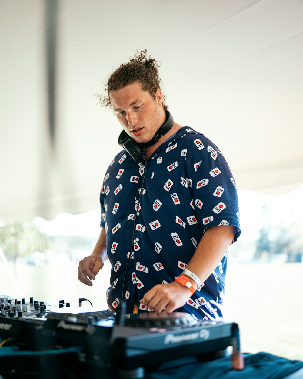 man in blue and white floral button up shirt