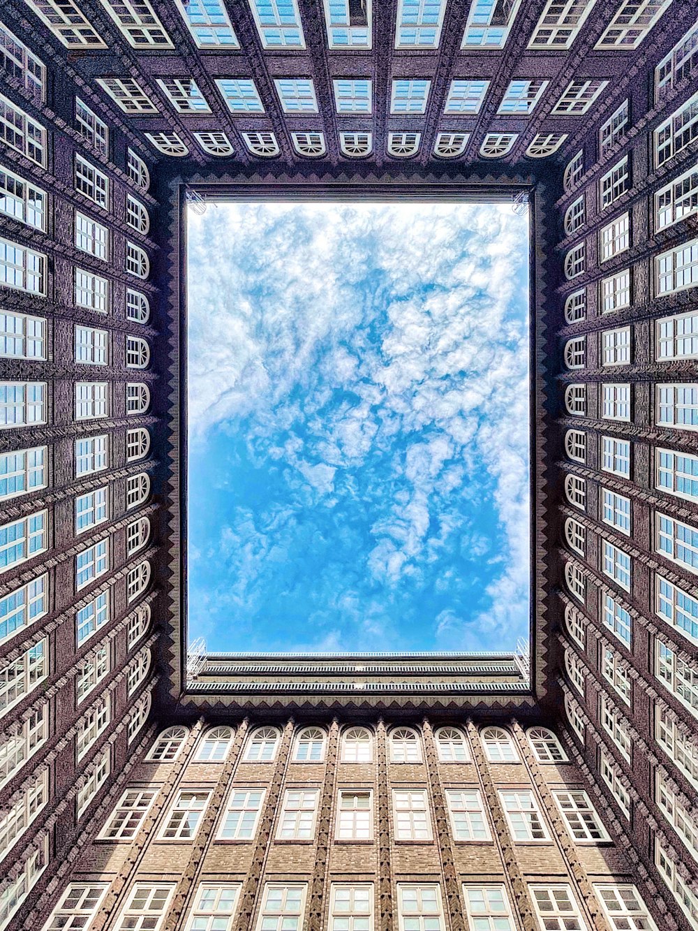 low angle photography of high rise building