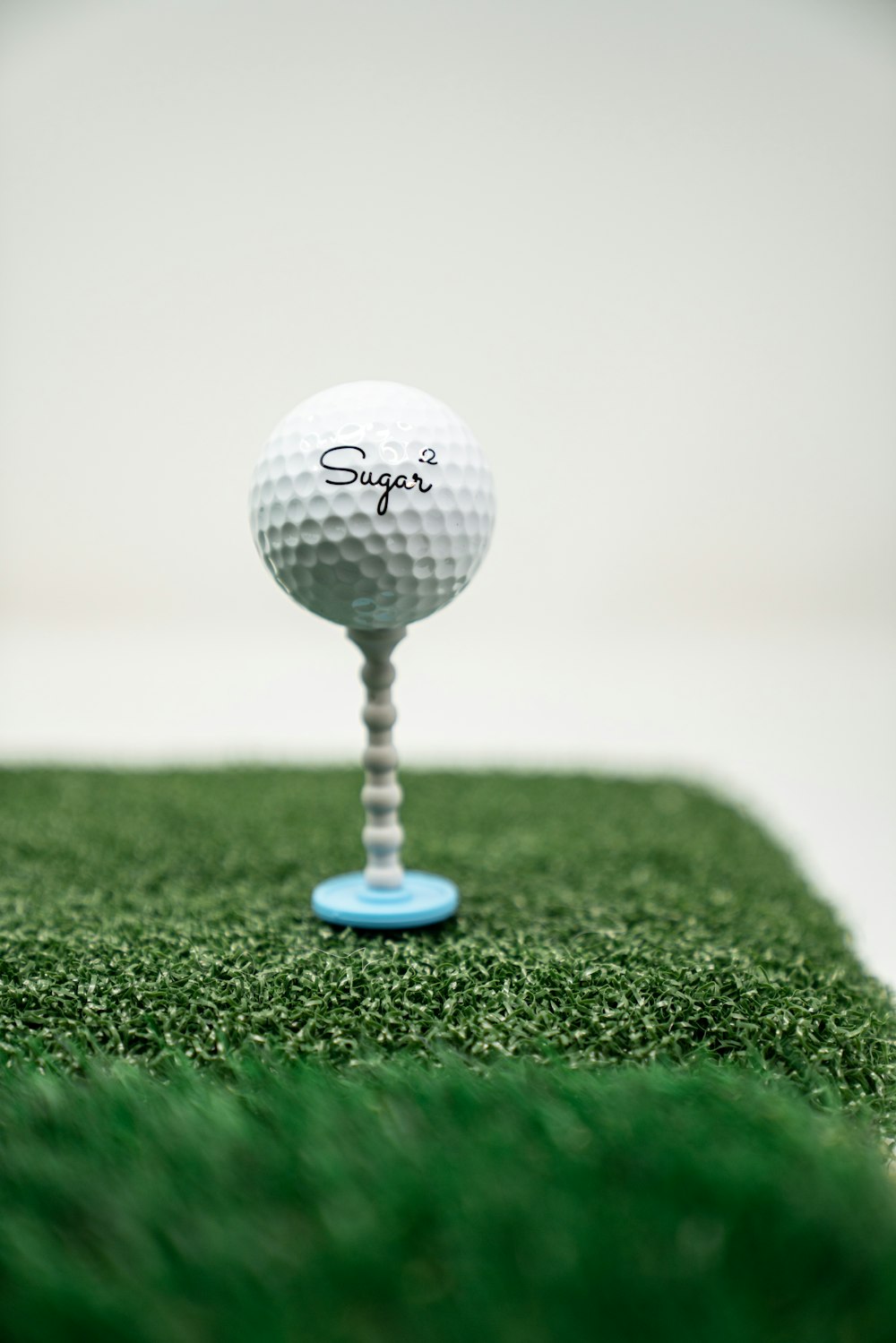 white golf ball on green grass