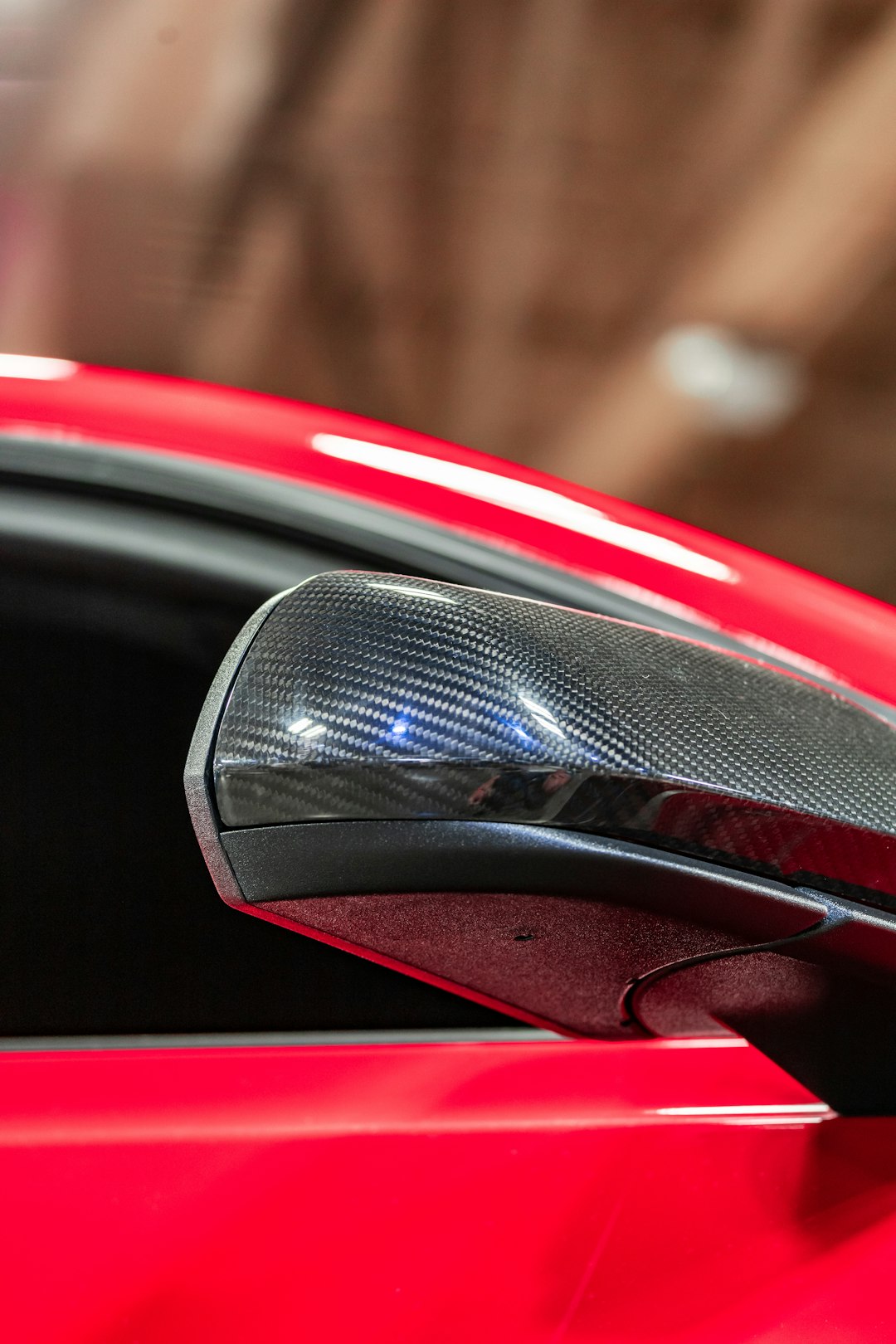 red and black car side mirror