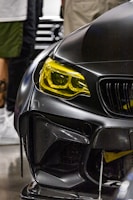 black and yellow car with yellow and black emblem