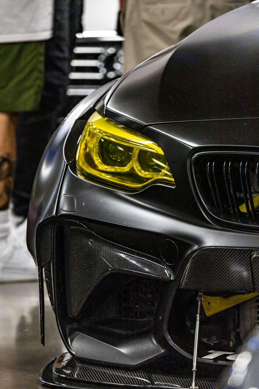 black and yellow car with yellow and black emblem