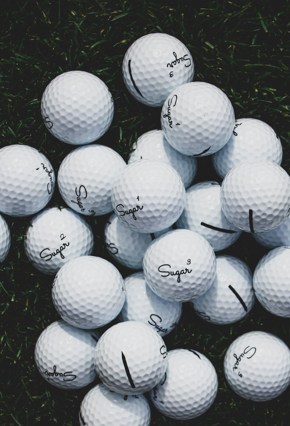 white golf ball on green grass