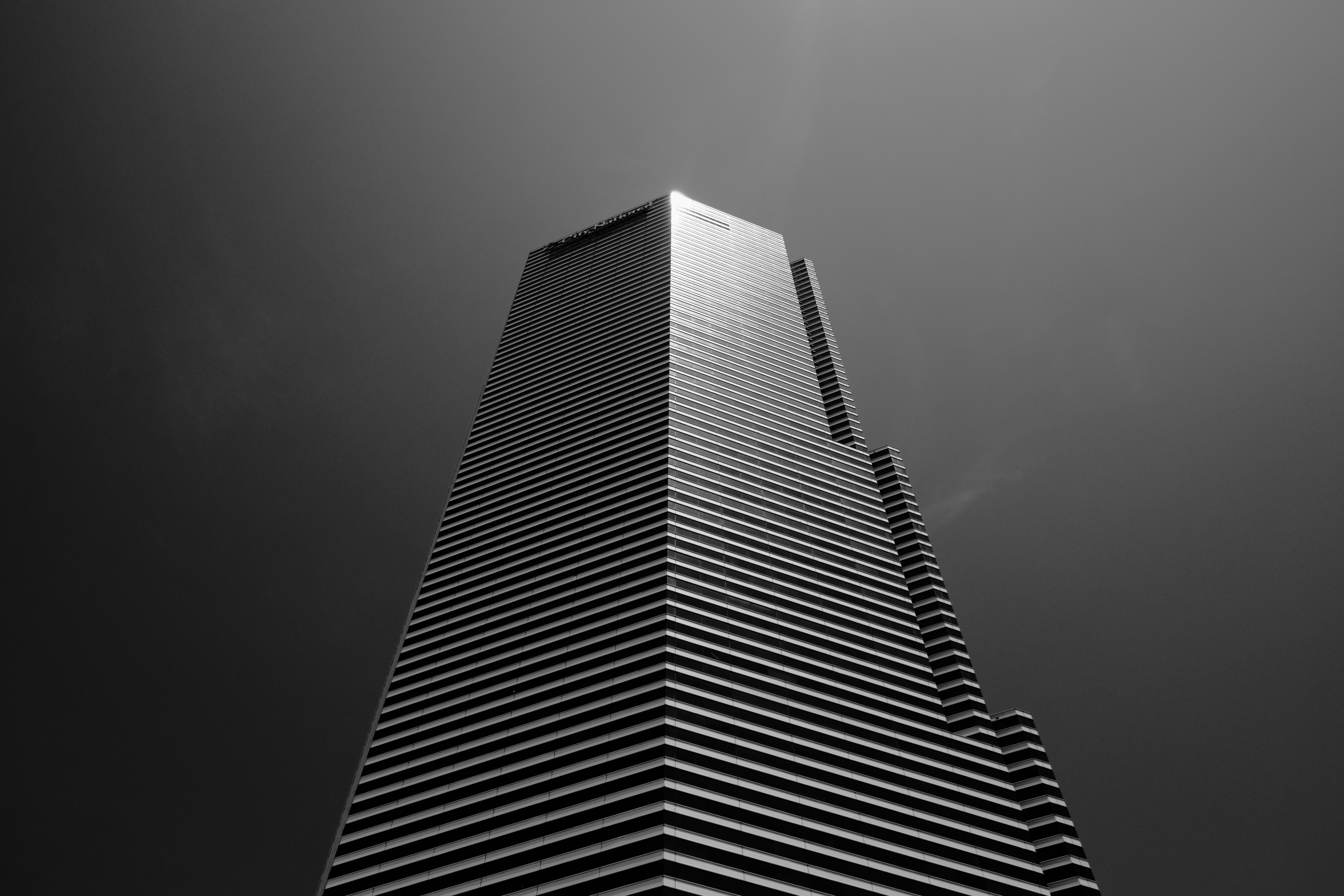 grayscale photo of high rise building