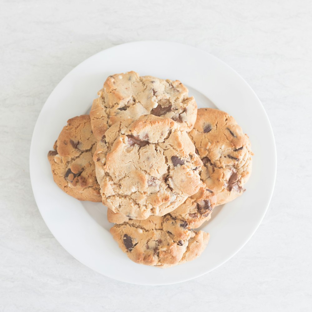 brown cookies on white ceramic plate