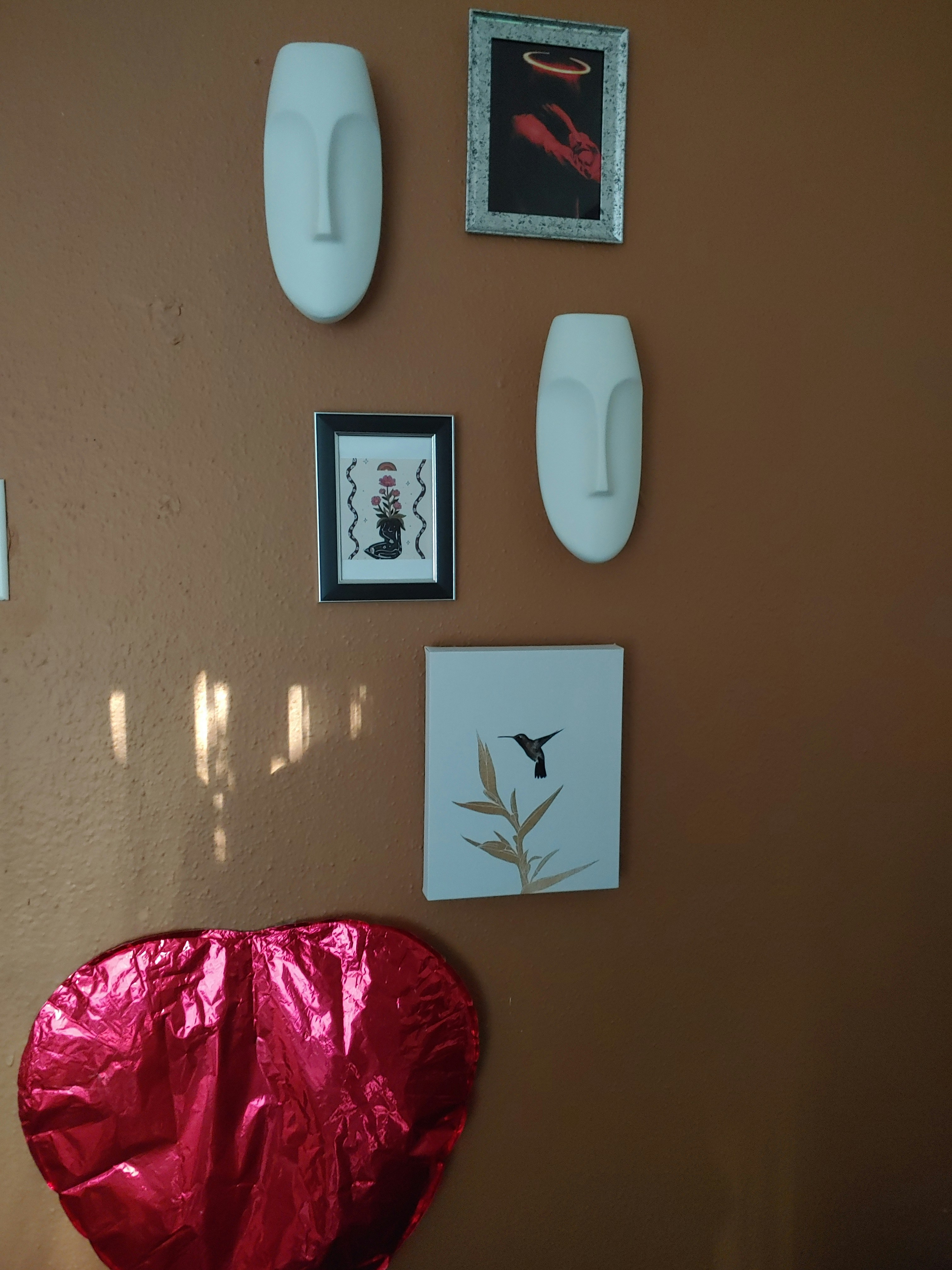 red plastic bag near white wall