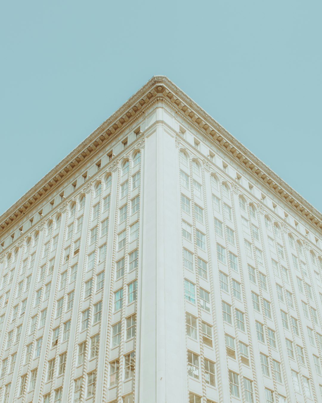 white concrete building under blue sky during daytime