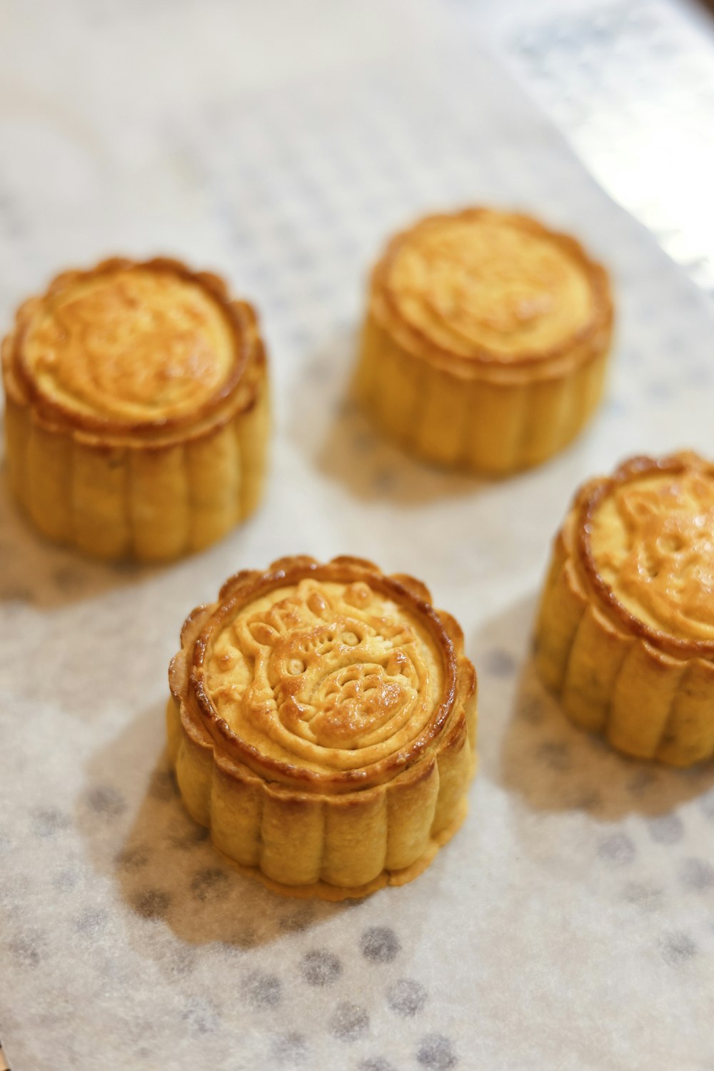 brown cookies on white textile