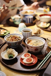 white ceramic bowl on white ceramic plate