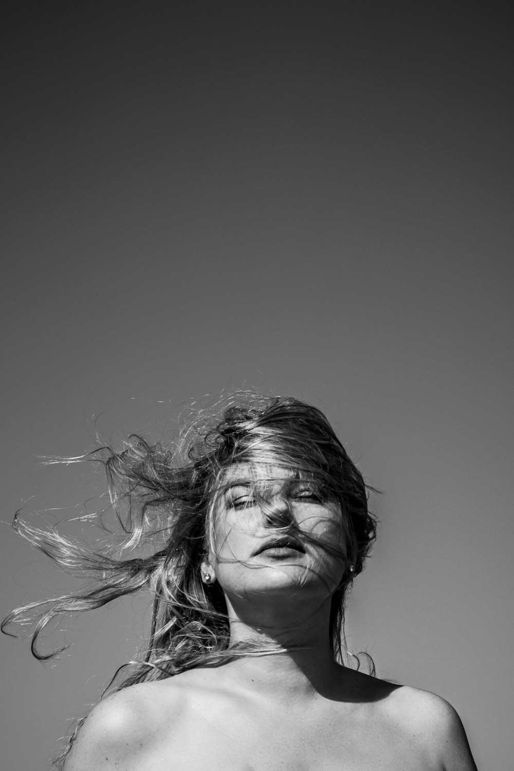 grayscale photo of woman with long hair