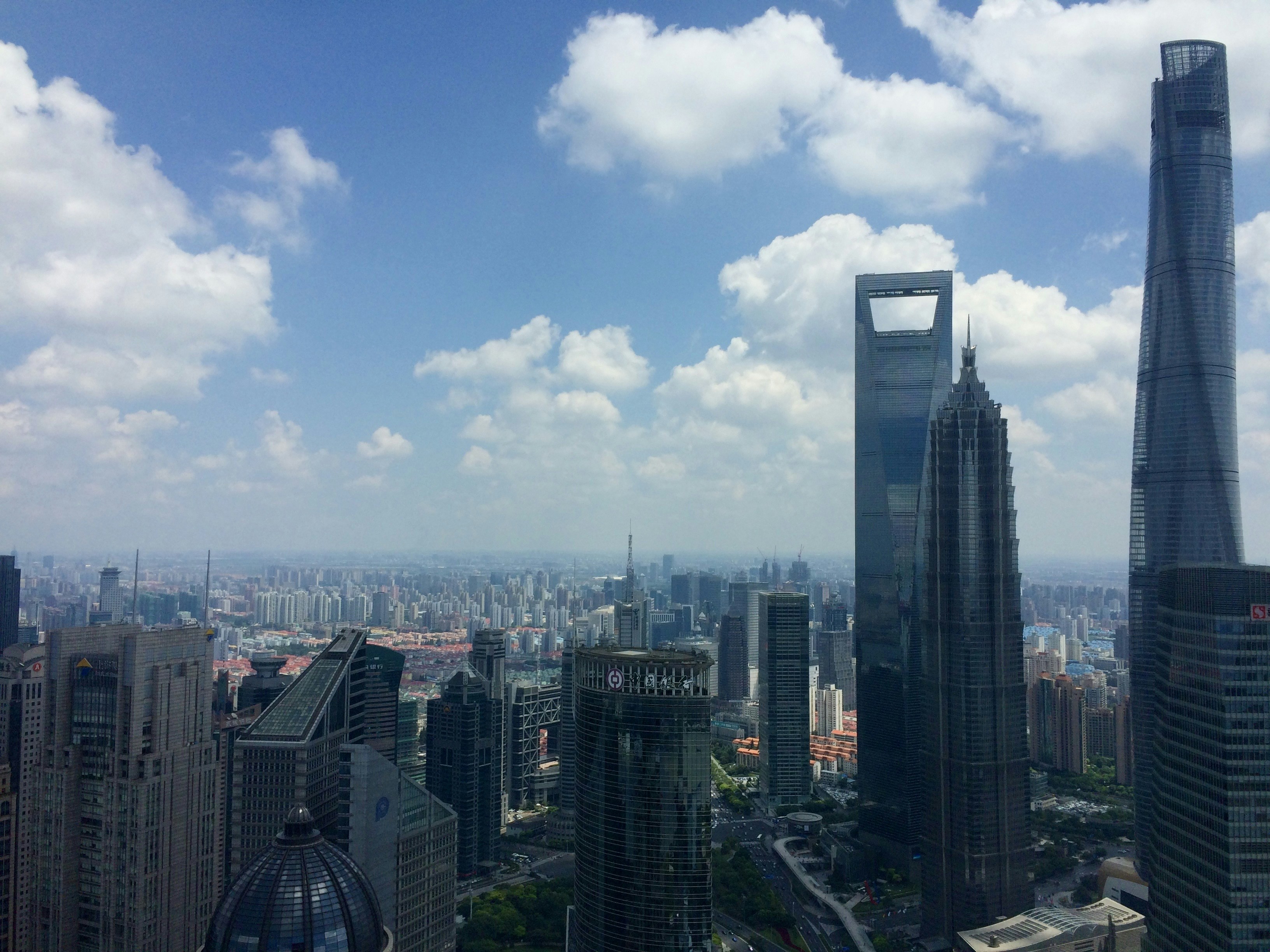 city buildings under blue sky during daytime
