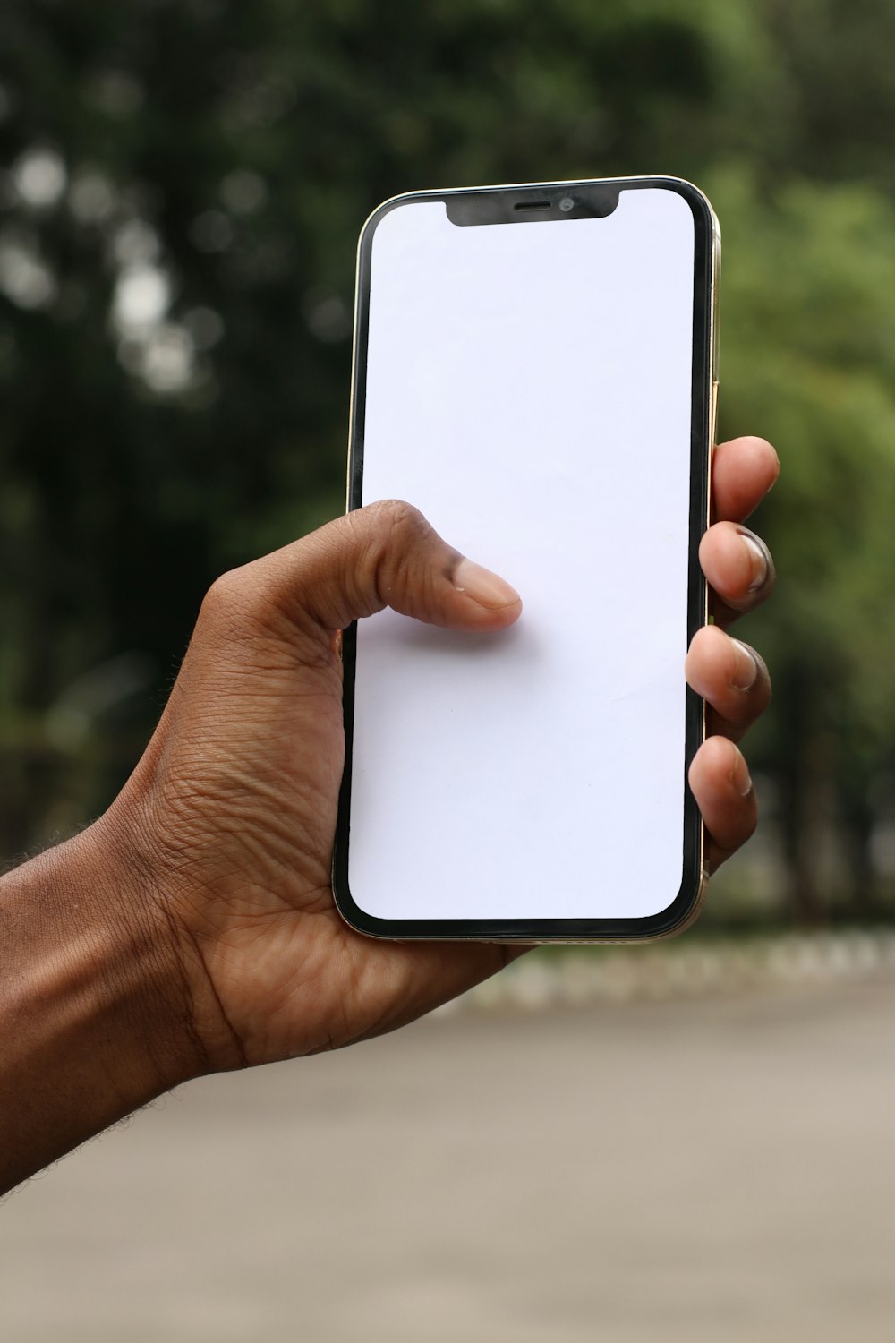 person holding white iphone 5 c