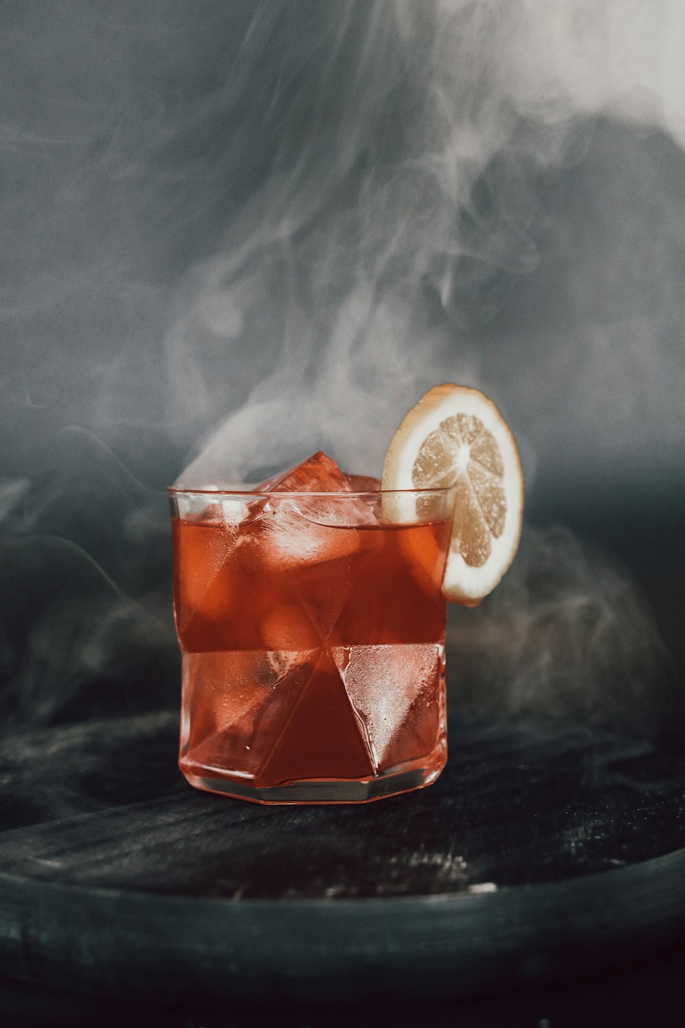 clear drinking glass with sliced lemon