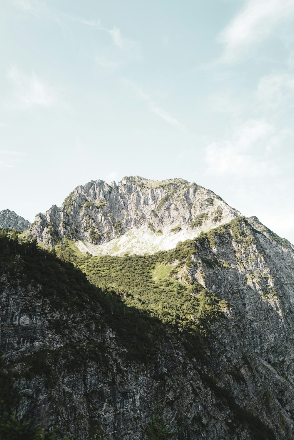 gray and white mountain under white sky during daytime