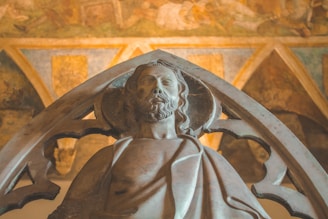 gold statue of a man