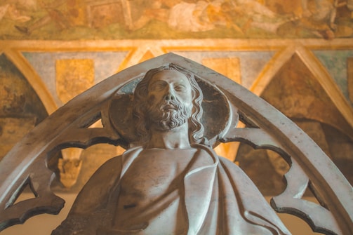 gold statue of a man