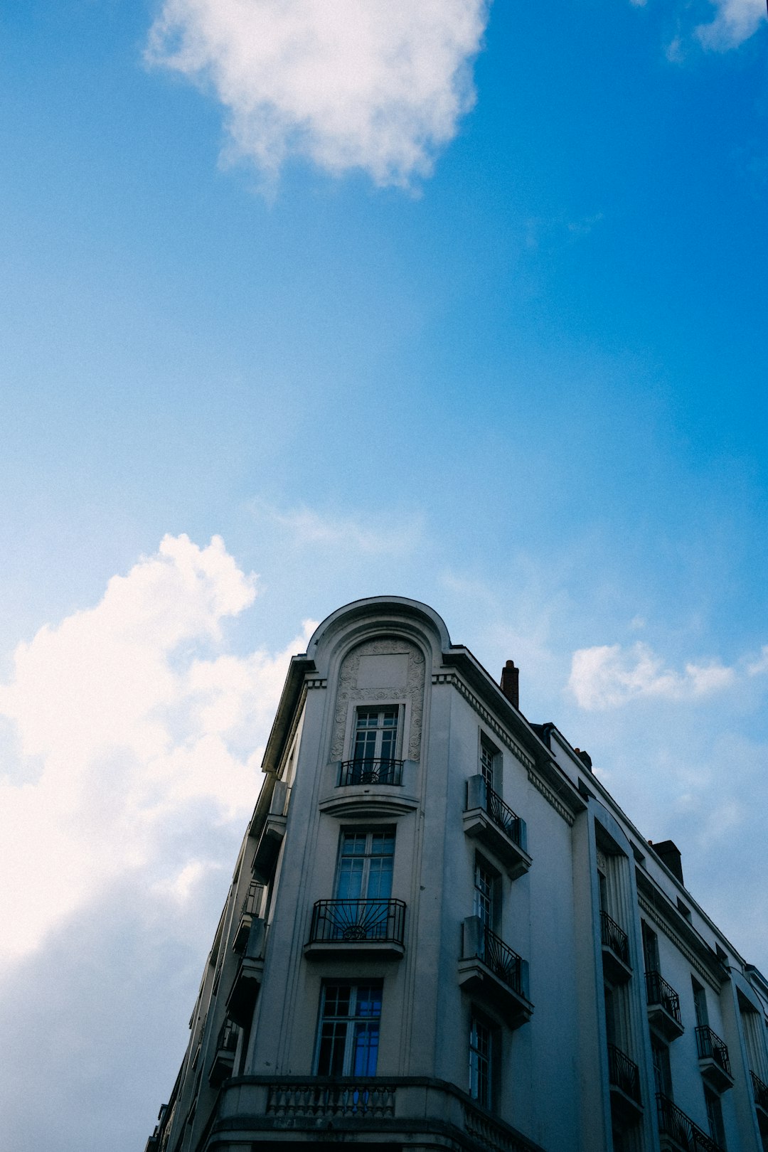 white concrete building under blue sky during daytime