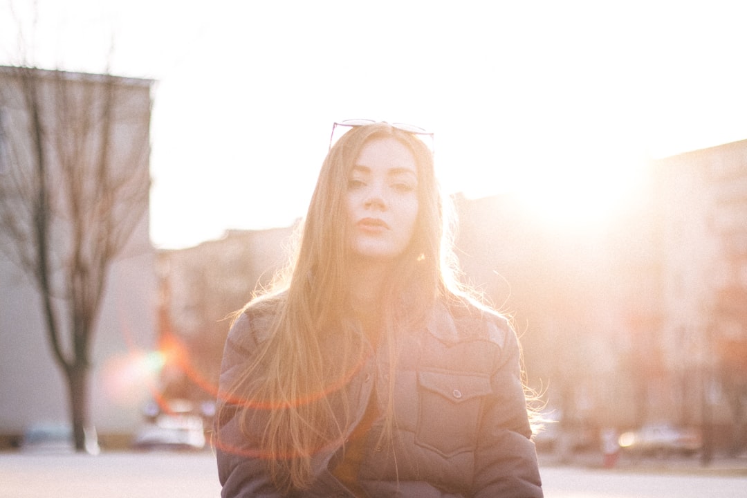 woman in brown long sleeve shirt